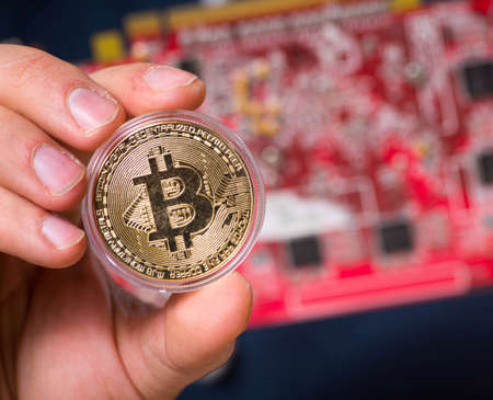 Young man in bitcoin mining concept