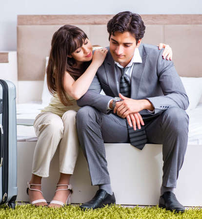 Wife seeing her husband off to business tripの写真素材