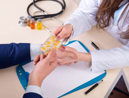 Man visiting doctor for routine check-upの写真素材