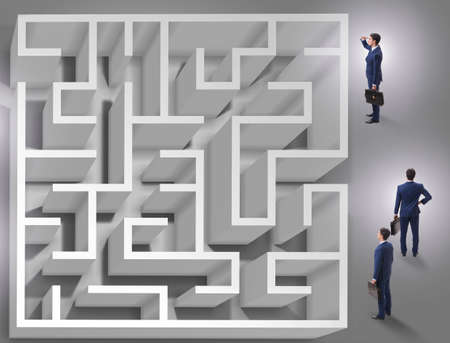 Businessman is trying to escape from maze labyrinthの写真素材