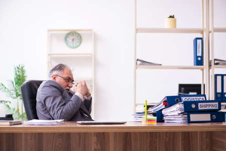 Businessman angry and furious at the workplaceの写真素材