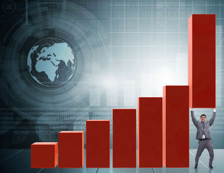 Businessman supporting growtn in economy on chart graph