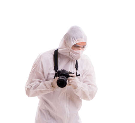 Forensic specialist in protective suit taking photos on whiteの写真素材