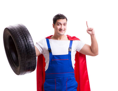 Superhero man with tyre isolated white backgroundの写真素材