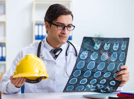 Safety doctor advising about wearing hard hat