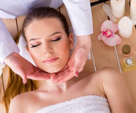 Young woman during spa procedure in salonの写真素材