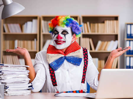 Clown businessman working in the office