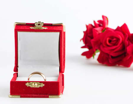 Wedding concept with rings and rosesの写真素材