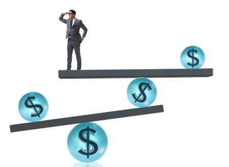 Businessman balancing in financial dollar concept