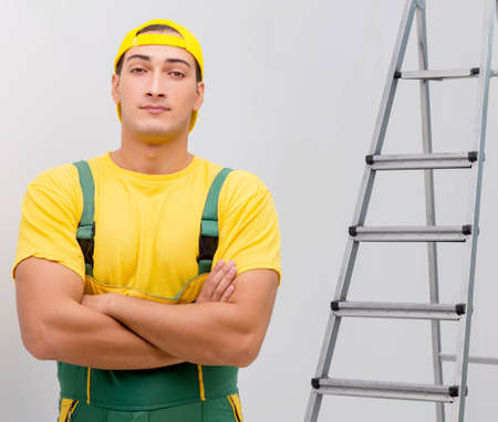 Repairman in coveralls in DIY conceptの写真素材