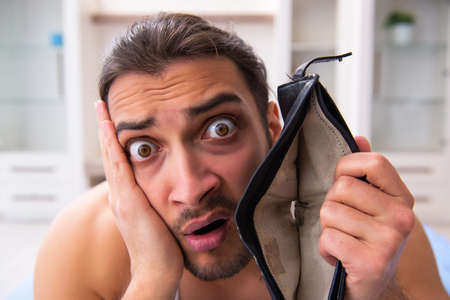 Young dismissed man in insolvency conceptの写真素材
