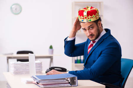Young king businessman employee working in the officeの写真素材