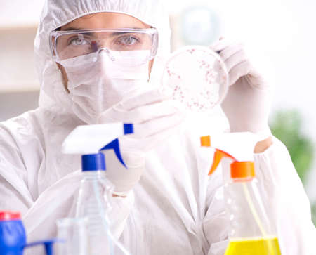 Chemist testing chemical substances in lab