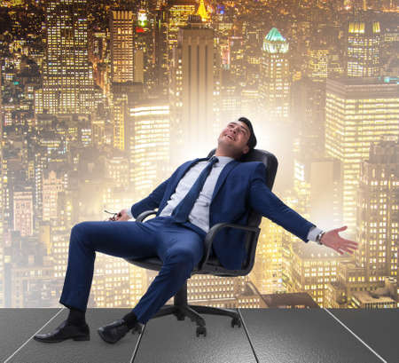 Young male businessman enjoying his time during vacationの写真素材