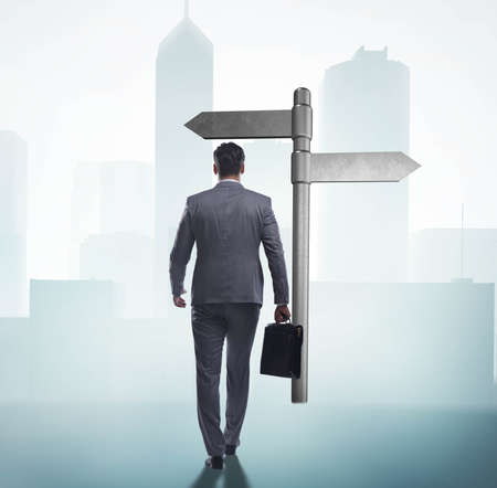 Businessman in difficult choice concept