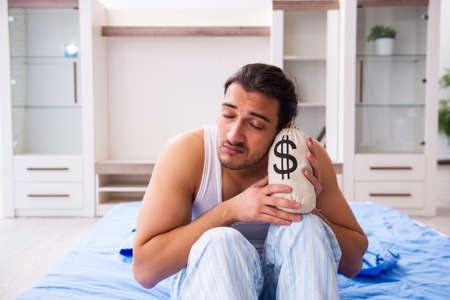 Young dismissed man in insolvency conceptの写真素材