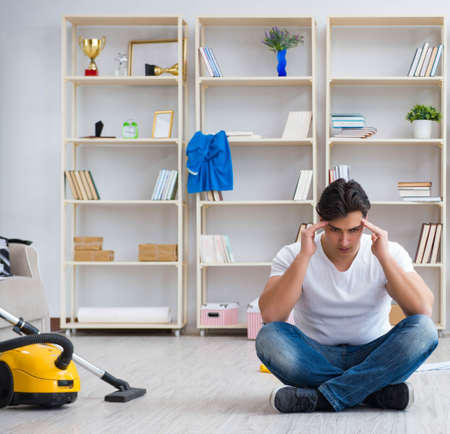 Man doing cleaning at homeの写真素材