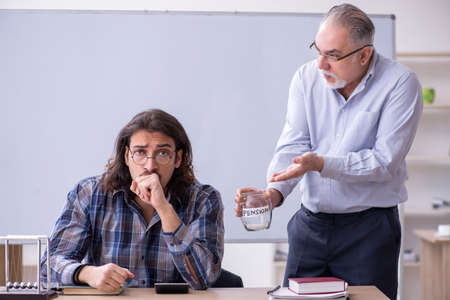 Two employees in retirement conceptの写真素材