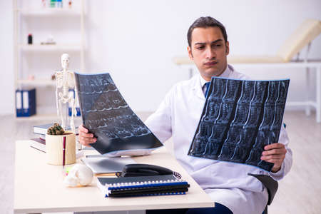 Young male doctor radiologist working in the clinic