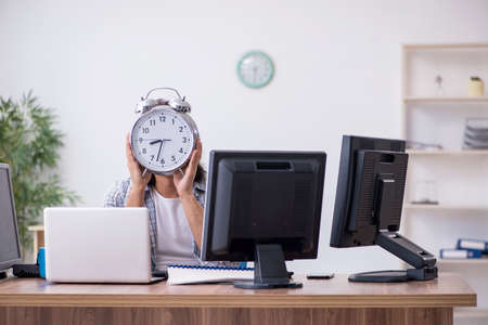 Young male it specialist working in the officeの写真素材
