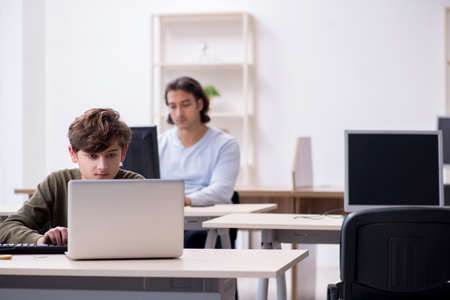 Father and son in it conceptの写真素材