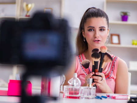 Beauty fashion blogger recording video for blogの写真素材