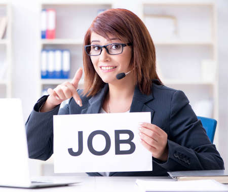 Businesswoman hiring new employees in officeの写真素材