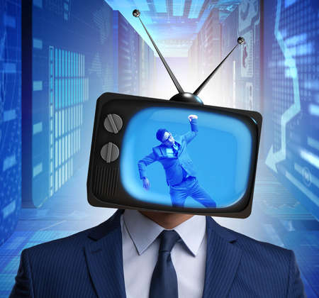 Man with television head in tv addiction conceptの写真素材