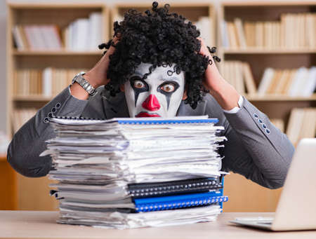 Clown businessman working in the office
