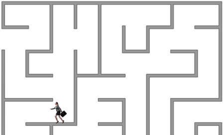 Businesswoman trying to escape from maze labyrinthの写真素材