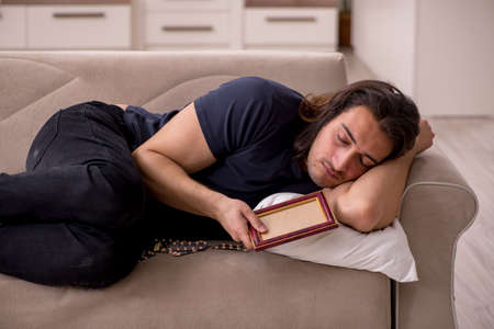 Young sick man suffering at home