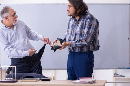 Two employees in bankruptcy conceptの写真素材