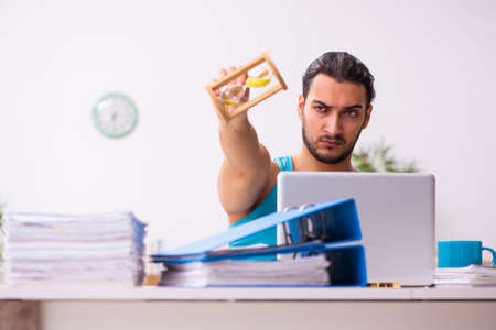 Young man working from house during pandemicの写真素材