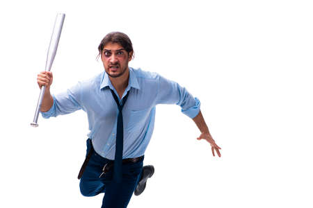 Young male employee holding baseball bat isolated on whiteの写真素材