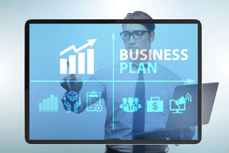 Business plan concept with businessman pressing button