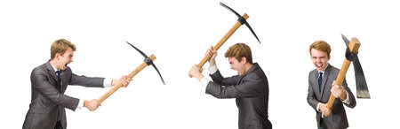 Young businessman with weapon isolated on whiteの写真素材