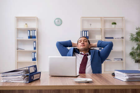 Young businessman working in the officeの写真素材