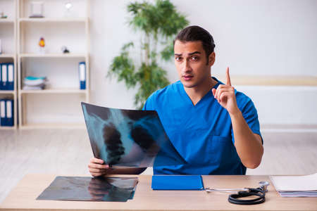 Young male doctor radiologist working in the clinic