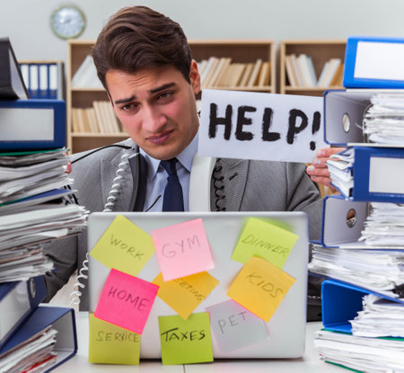 Busy businessman asking for help with workの写真素材
