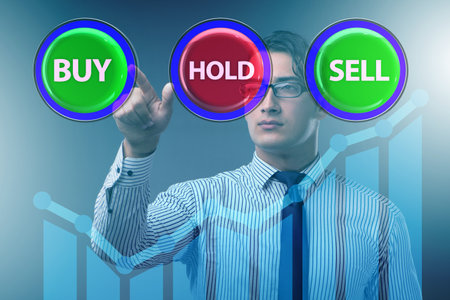 Concept of commercial choices between buying holding and sellingの写真素材