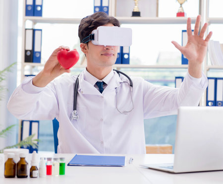 Doctor working with virtual VR reality glassesの写真素材