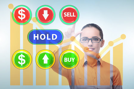 Concept of commercial choices between buying holding and sellingの写真素材