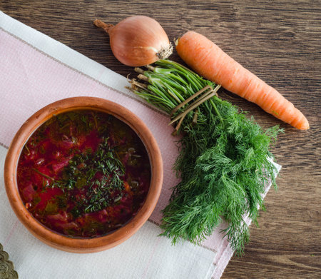 Bowl of traditional soup Borscht on tableの写真素材