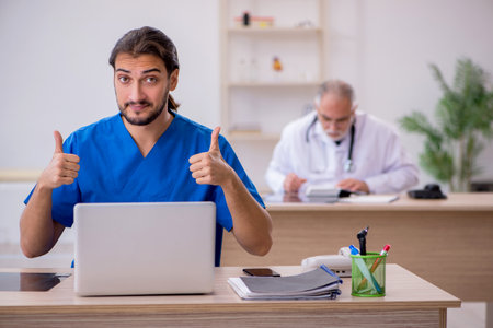 Two doctors working in the clinicの写真素材