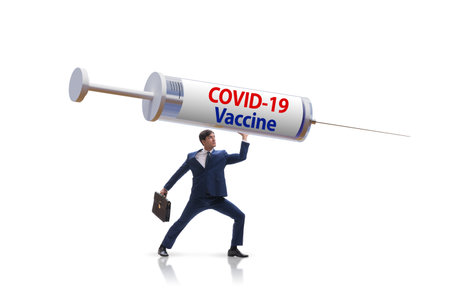 Businessman in covid-19 coronavirus vaccination conceptの写真素材