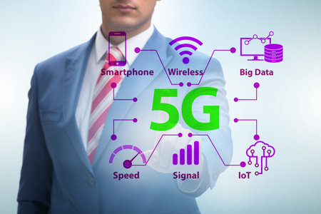 Businessman pressing button in 5g conceptの写真素材