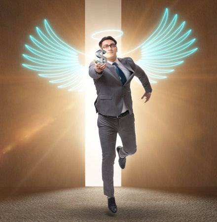 Angel investor concept with businessman with wingsの写真素材