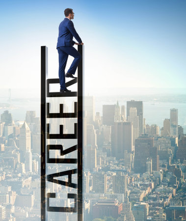 Businessman in career ladder conceptの写真素材