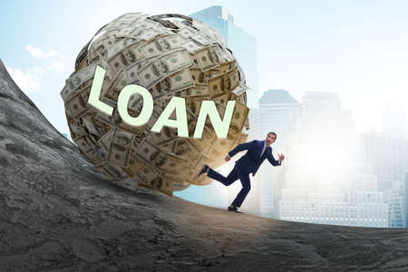 Businessman running away in debt and loan concept
