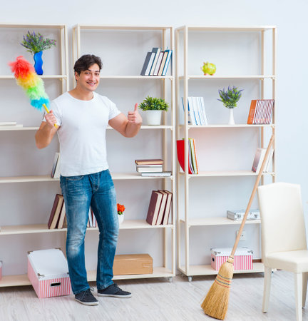 Man doing cleaning at homeの写真素材
